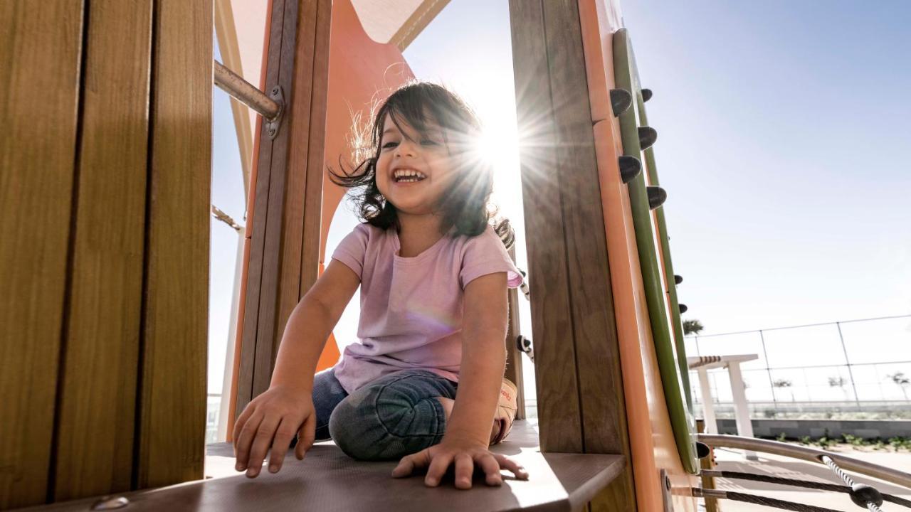 Intercontinental Ras Al Khaimah Mina Al Arab Resort & Spa By Ihg Eksteriør bilde A child playing at the Children's Museum of Oak Park